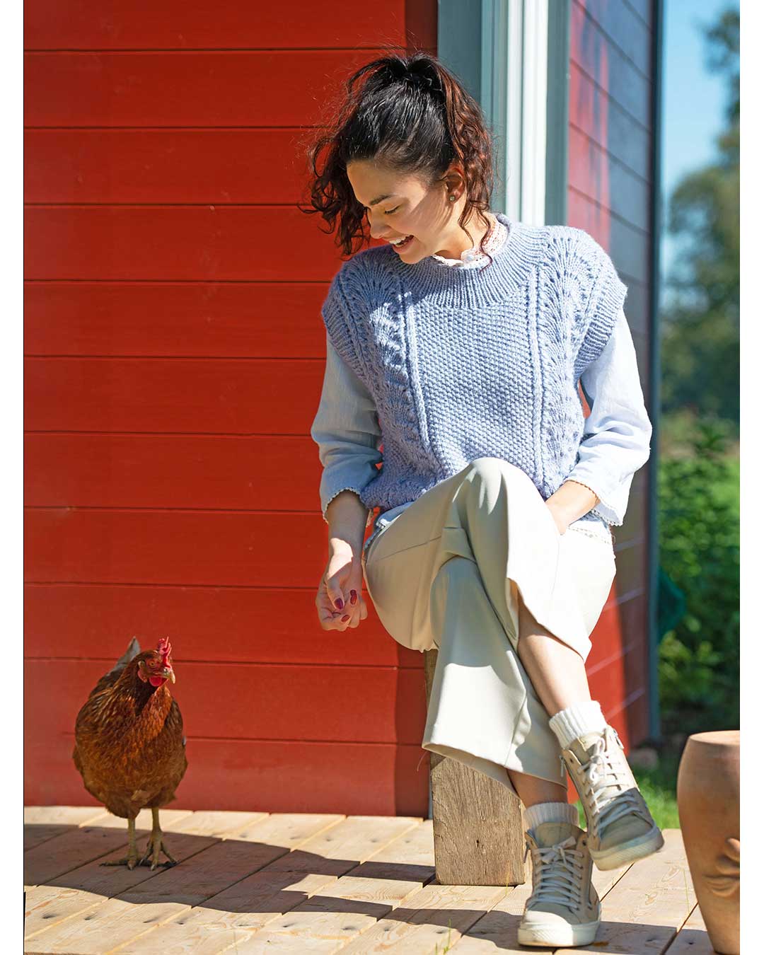 Sweater vest with openwork stripes
